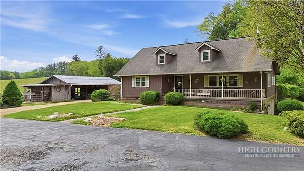 7.6 Acres of Land with Home for Sale in Spruce Pine, North Carolina