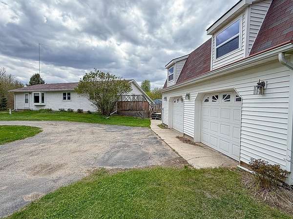 10 Acres of Recreational Land with Home for Sale in Beaverton, Michigan