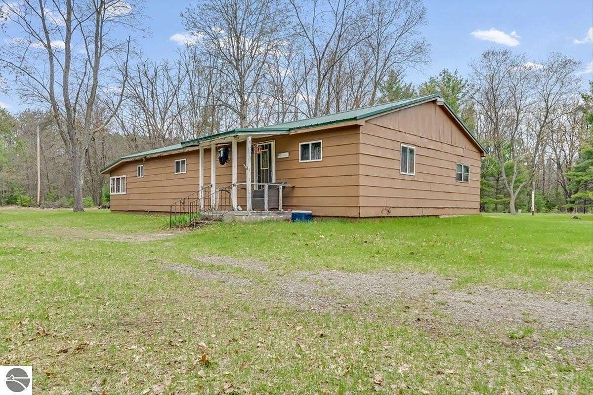 40 Acres of Land with Home for Sale in Whittemore, Michigan