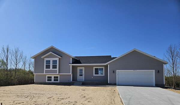 1.57 Acres of Land with Home for Sale in Whitehall, Michigan