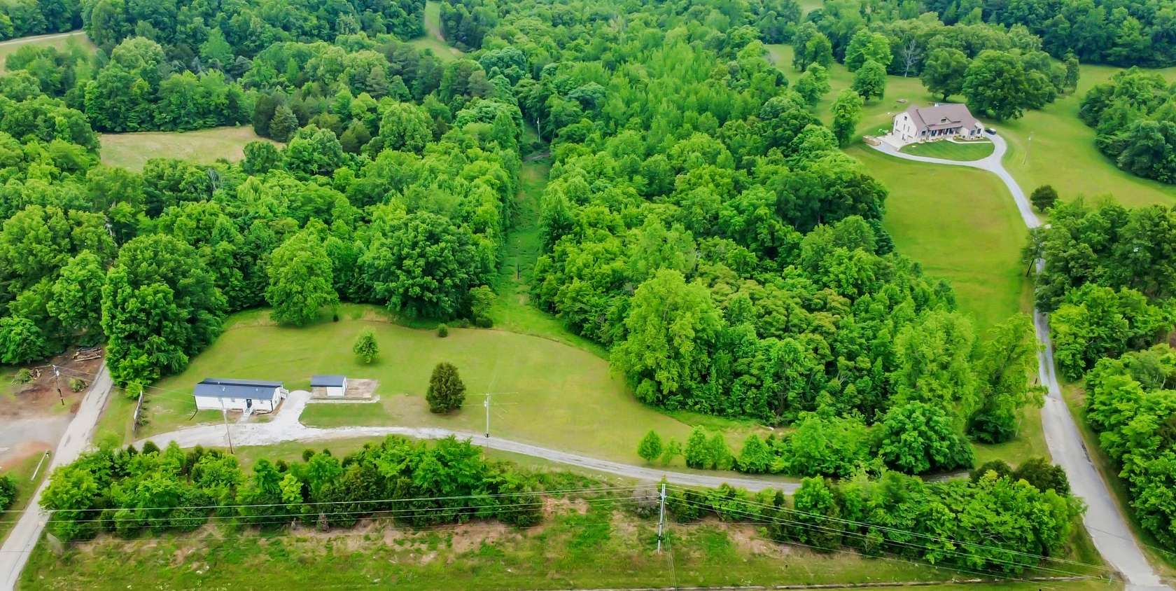 3 Acres of Land with Home for Sale in Palmyra, Tennessee