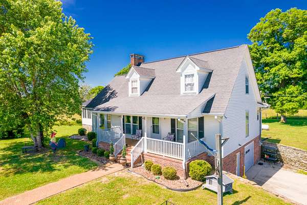 22.8 Acres of Agricultural Land with Home for Sale in Lewisburg, Tennessee