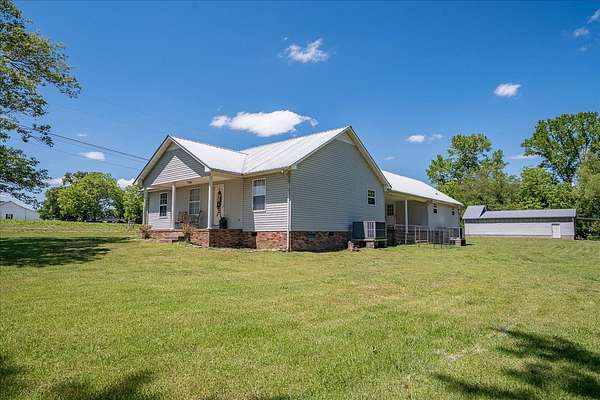 1.6 Acres of Land with Home for Sale in Lawrenceburg, Tennessee