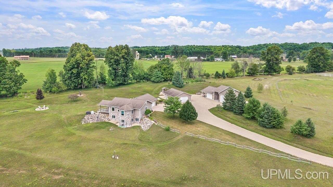 80 Acres of Recreational Land with Home for Sale in Vulcan, Michigan