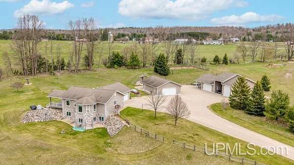80 Acres of Land with Home for Sale in Vulcan, Michigan