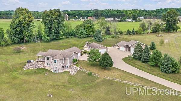 80 Acres of Recreational Land with Home for Sale in Vulcan, Michigan