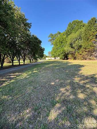 4 Acres of Land with Home for Sale in Matthews, North Carolina