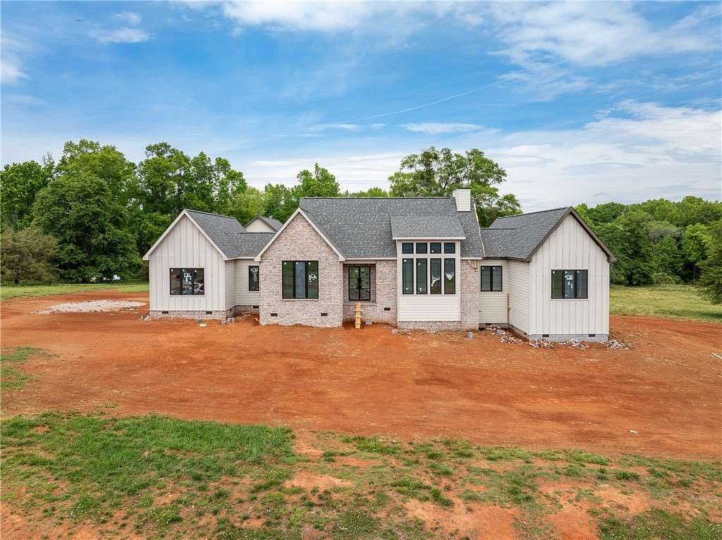 6 Acres of Land with Home for Sale in Pelzer, South Carolina
