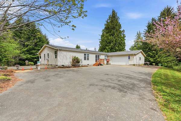 5 Acres of Land with Home for Sale in Coos Bay, Oregon
