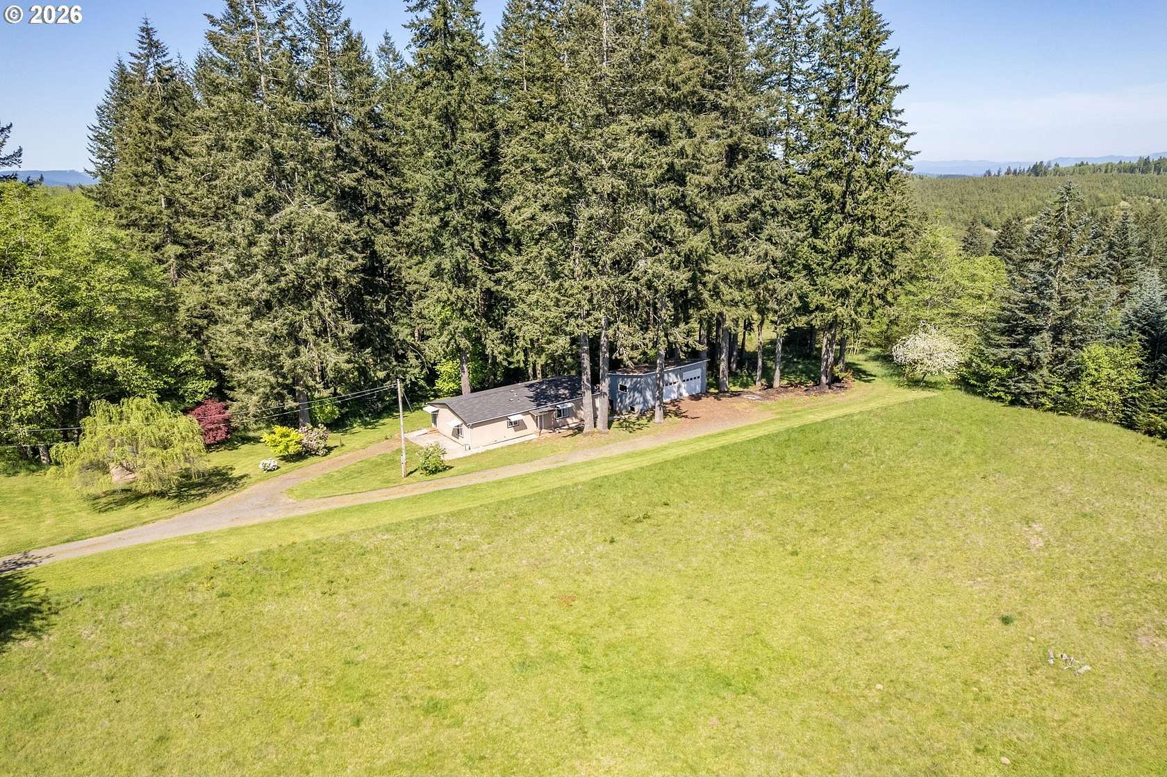 2.64 Acres of Land with Home for Sale in Rainier, Oregon