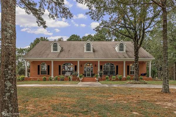 77 Acres of Recreational Land with Home for Sale in Benton, Louisiana