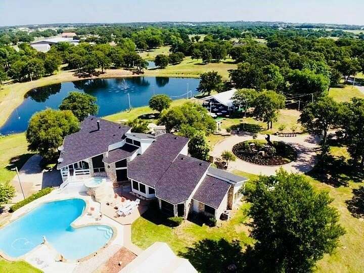 4.9 Acres of Land with Home for Lease in Pilot Point, Texas