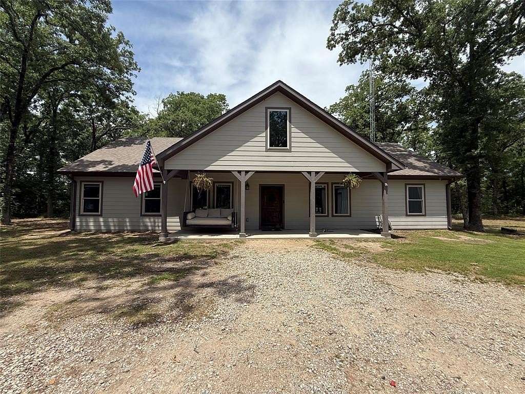 3 Acres of Land with Home for Sale in Quinlan, Texas