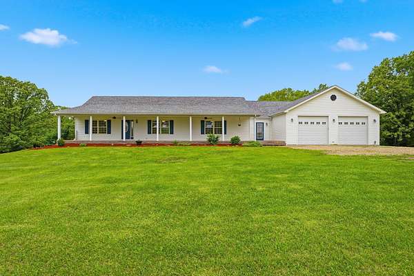 7 Acres of Land with Home for Sale in Fulton, Missouri