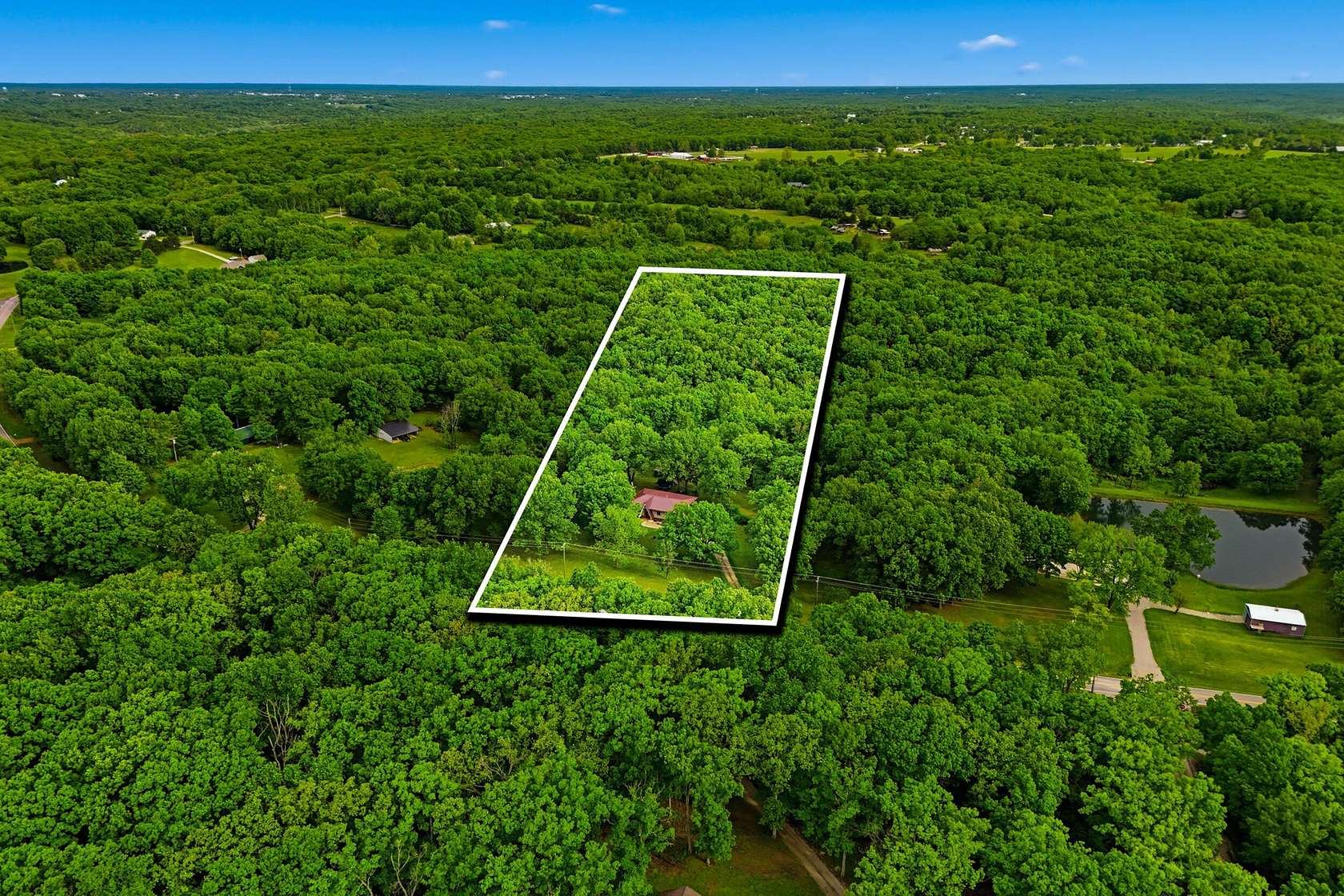 13.7 Acres of Recreational Land with Home for Sale in Tebbetts, Missouri
