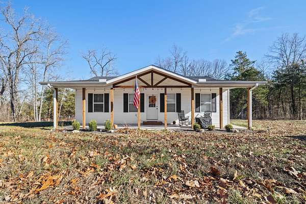 5.15 Acres of Land with Home for Sale in Mansfield, Missouri