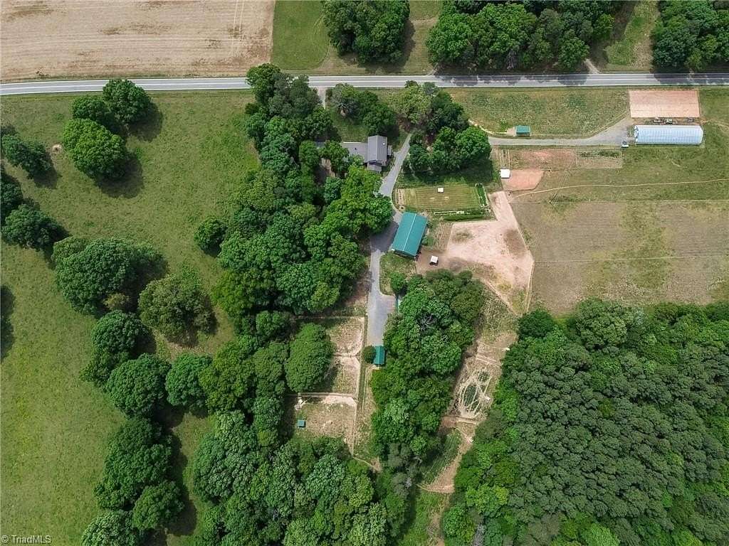 5.9 Acres of Land with Home for Sale in Hamptonville, North Carolina