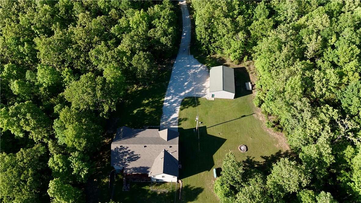 5.32 Acres of Land with Home for Sale in Elkins, Arkansas