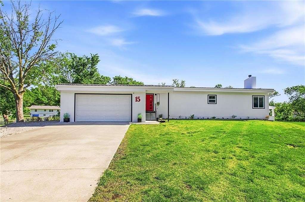 1.69 Acres of Land with Home for Sale in Lee's Summit, Missouri