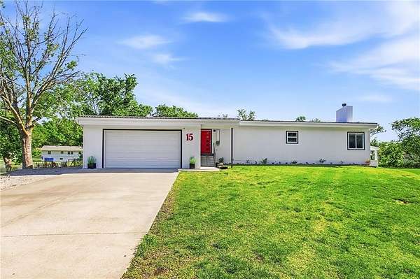 1.69 Acres of Land with Home for Sale in Lee's Summit, Missouri