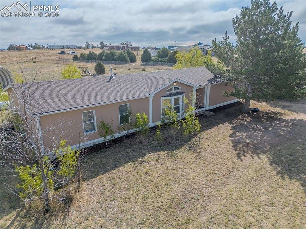 2.45 Acres of Land with Home for Sale in Peyton, Colorado
