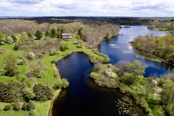 34.2 Acres of Recreational Land with Home for Sale in Howell, Michigan