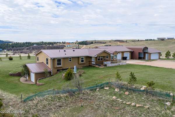 5 Acres of Land with Home for Sale in Sundance, Wyoming