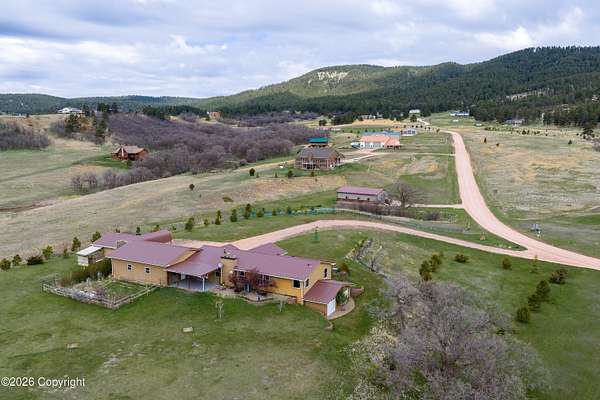 5 Acres of Land with Home for Sale in Sundance, Wyoming