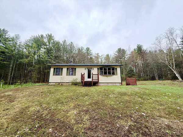 5.3 Acres of Land with Home for Sale in Morrisonville, New York