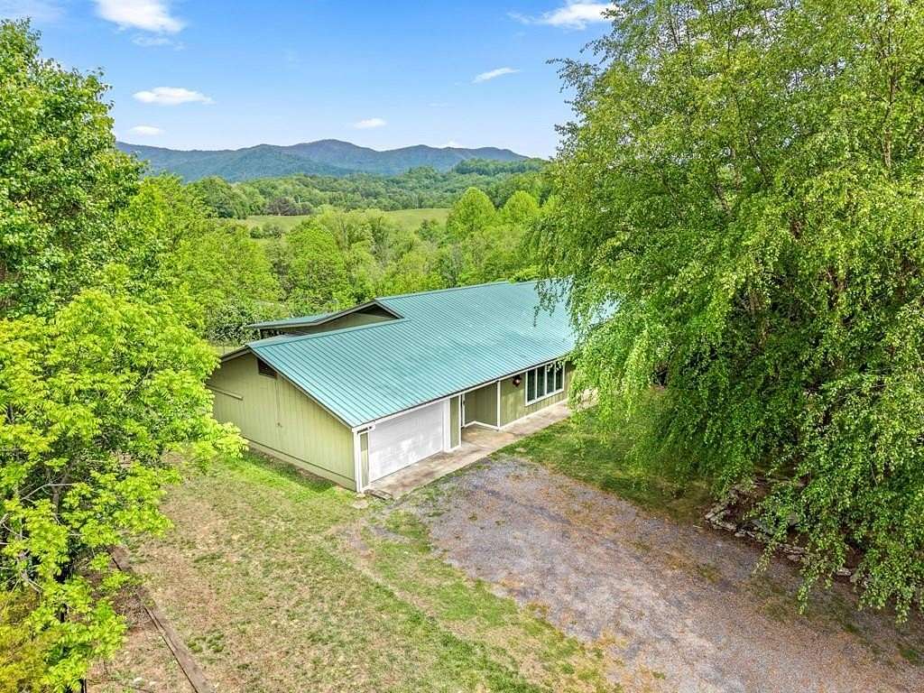5.65 Acres of Land with Home for Sale in Whittier, North Carolina