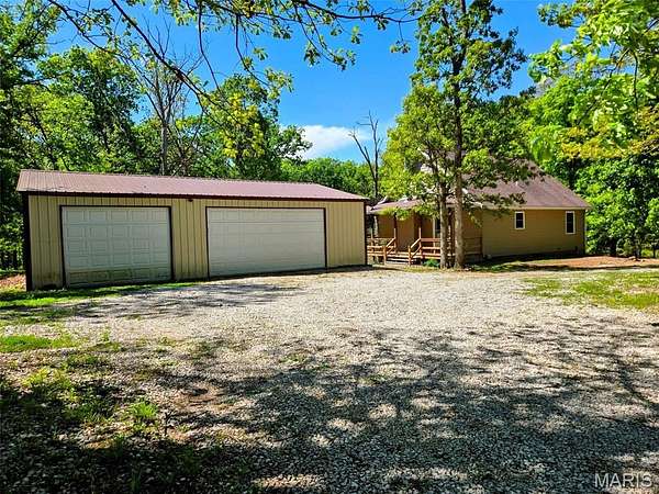 5.13 Acres of Land with Home for Sale in Stoutsville, Missouri