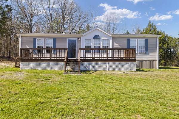 15.5 Acres of Land with Home for Sale in Gainesville, Missouri