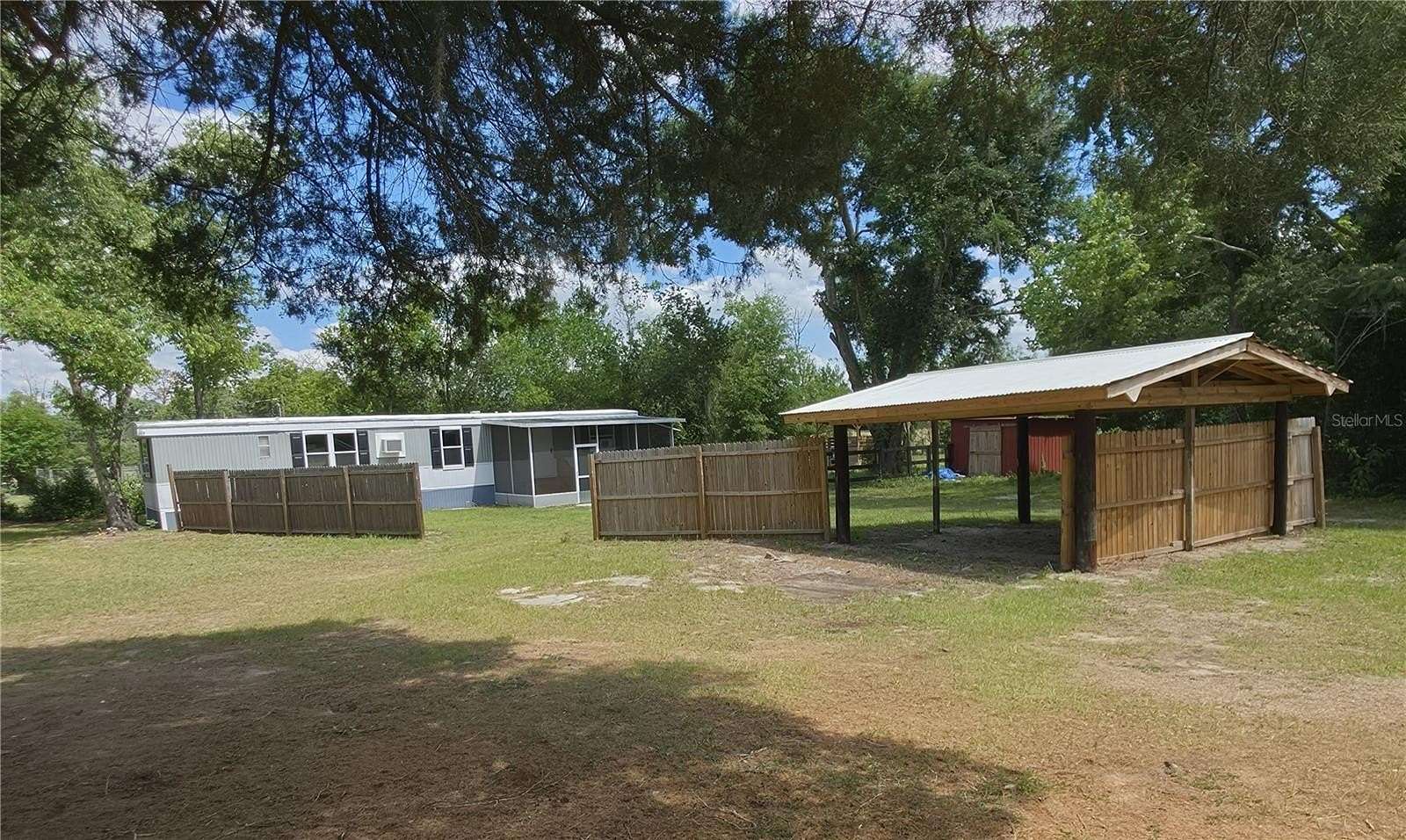 1.65 Acres of Land with Home for Sale in Summerfield, Florida