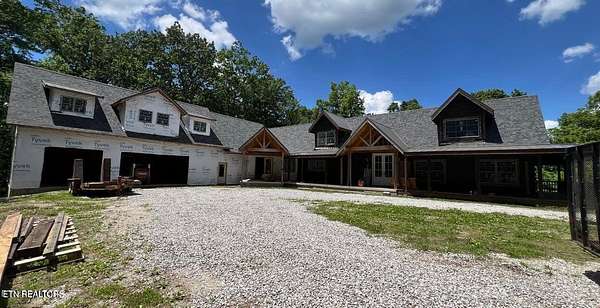 8.29 Acres of Land with Home for Sale in Oneida, Tennessee