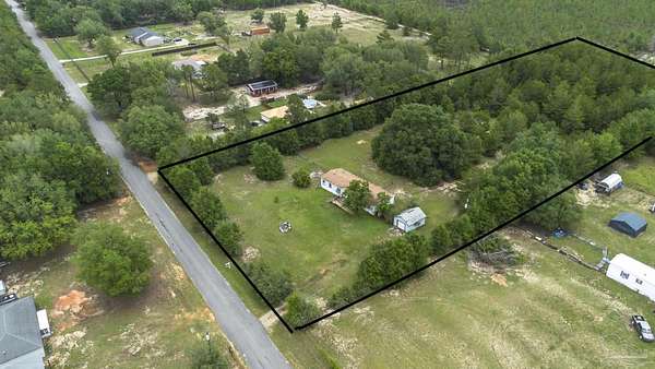 3.27 Acres of Land with Home for Sale in Milton, Florida