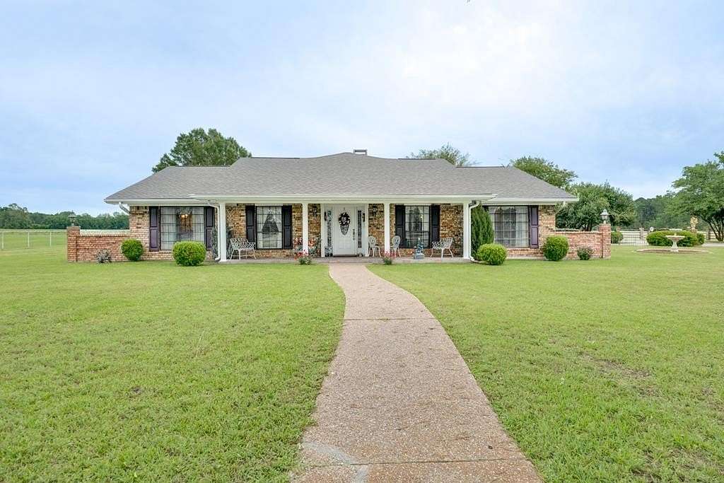45 Acres of Recreational Land with Home for Sale in Palestine, Texas
