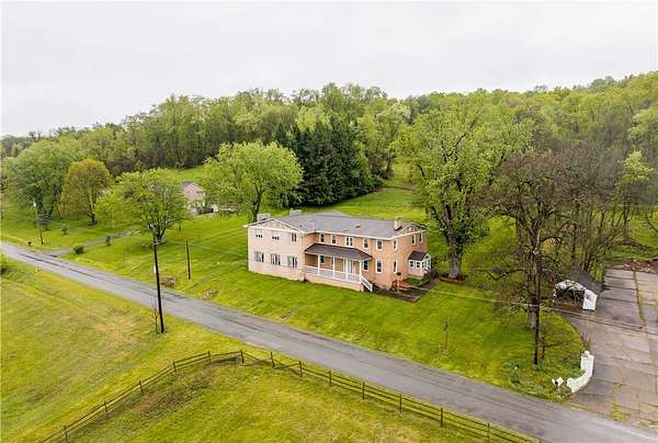 71.6 Acres of Land with Home for Sale in Finleyville, Pennsylvania