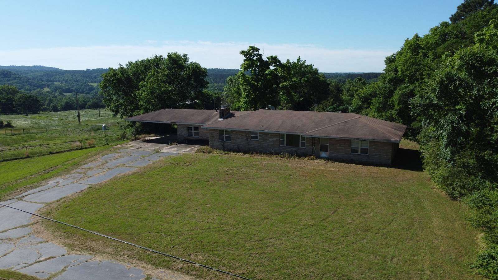 2 Acres of Land with Home for Auction in Ozark, Arkansas
