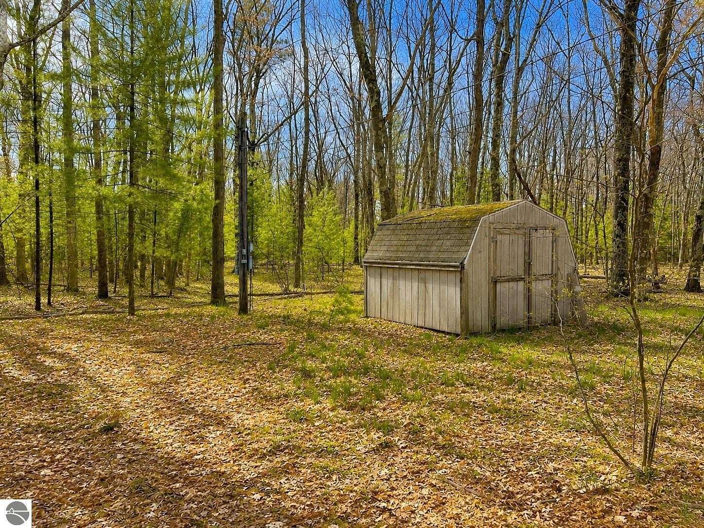 0.8 Acres of Land for Sale in Interlochen, Michigan