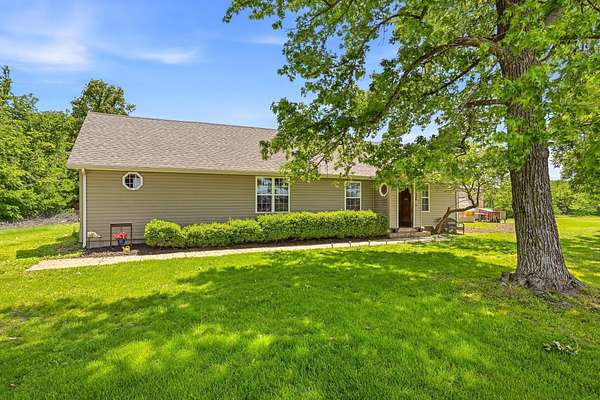 5 Acres of Land with Home for Sale in Bois D'Arc, Missouri