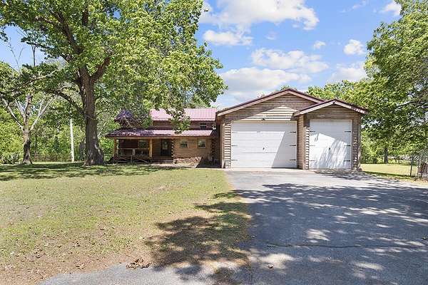 4.79 Acres of Land with Home for Sale in Joplin, Missouri