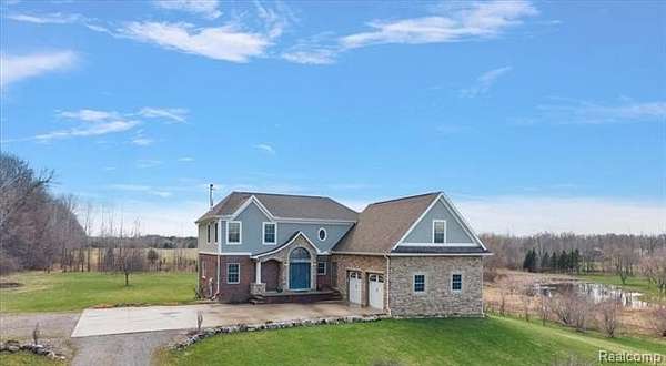 3.2 Acres of Land with Home for Sale in Hadley Township, Michigan