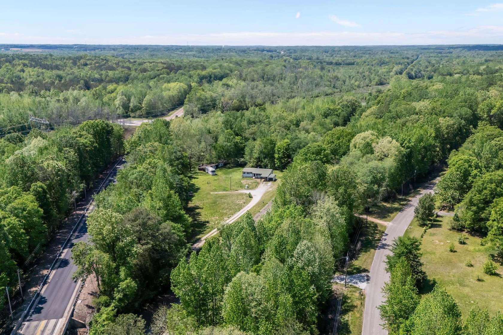 11 Acres of Land with Home for Sale in Bruceton, Tennessee