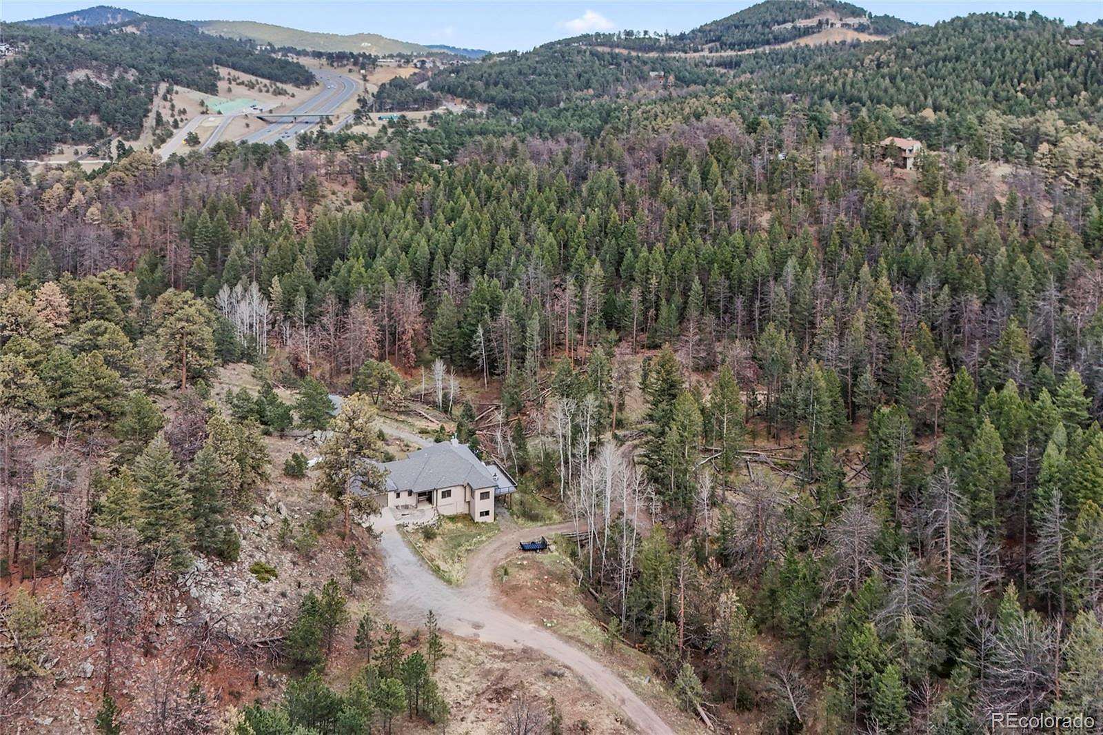 15 Acres of Land with Home for Sale in Evergreen, Colorado