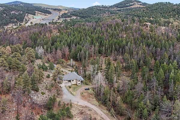 15 Acres of Land with Home for Sale in Evergreen, Colorado