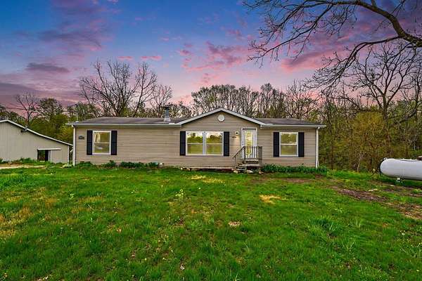 4.88 Acres of Land with Home for Sale in Allendale, Michigan