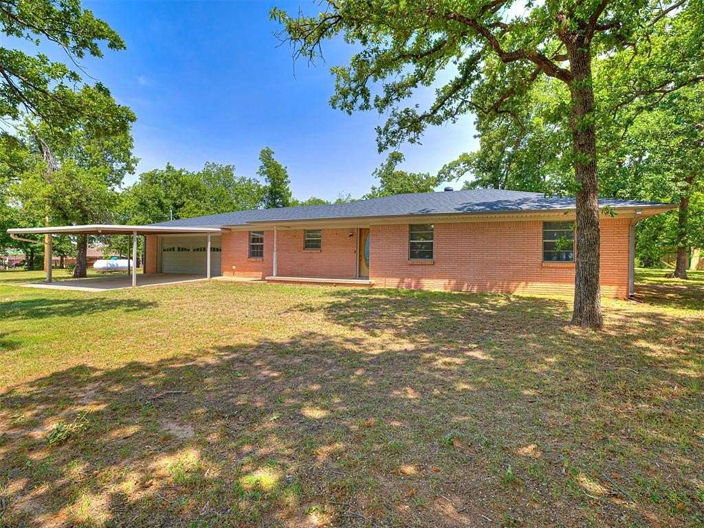 10 Acres of Land with Home for Sale in Harrah, Oklahoma
