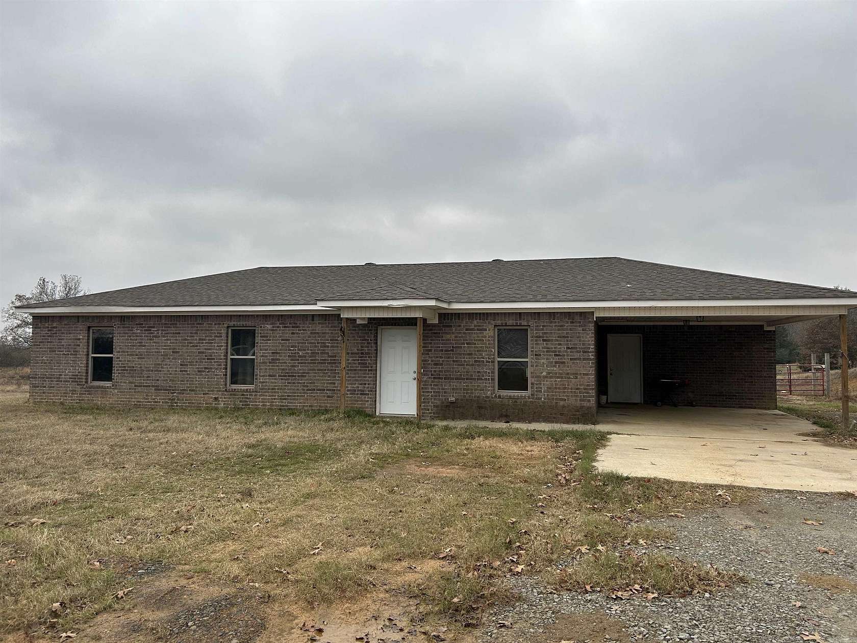 1.83 Acres of Land with Home for Sale in Romance, Arkansas
