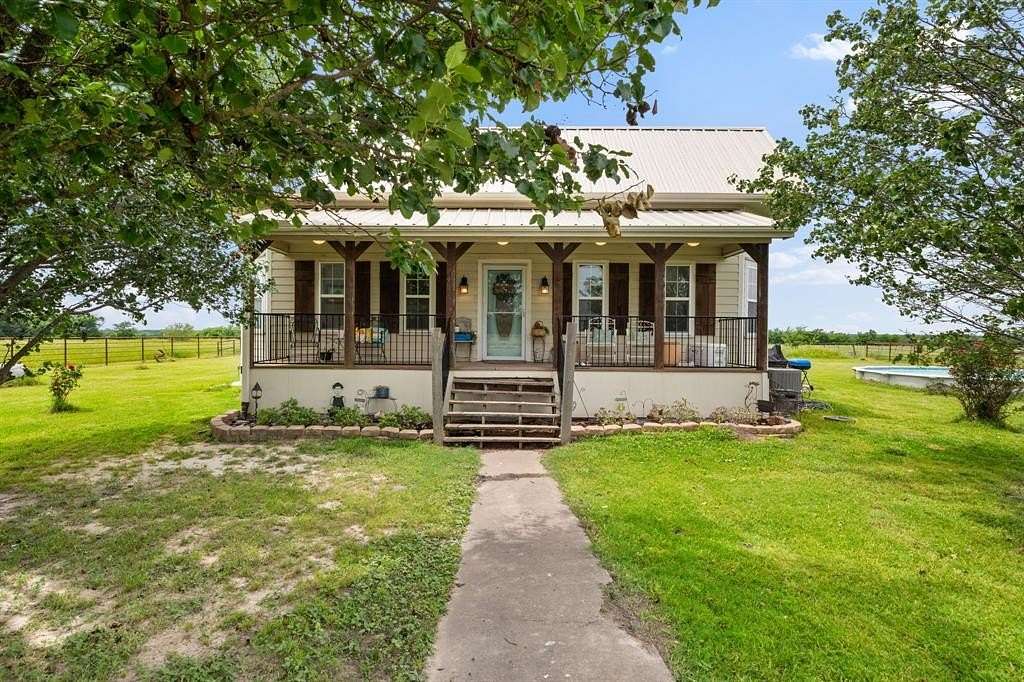 89.4 Acres of Land with Home for Sale in Wolfe City, Texas