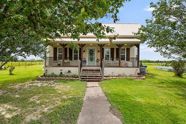 89.4 Acres of Land with Home for Sale in Wolfe City, Texas